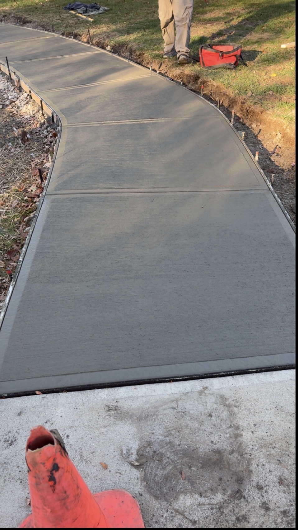 New curved concrete walkway